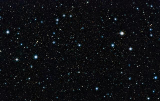 A section of the widest deep view of the sky ever taken using infrared light, with a total effective exposure time of 55 hours. It shows a region of the sky known as the COSMOS field in the constellation of Sextans
