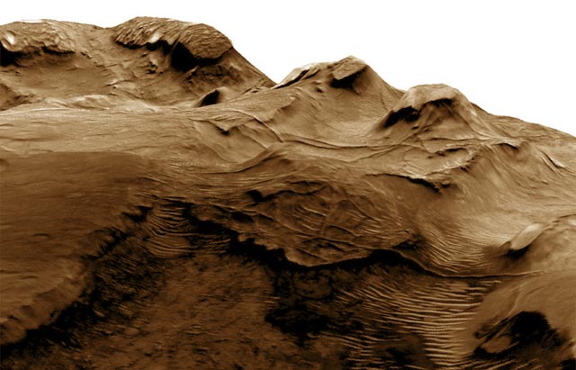 This 3D image of an impact crater in the Nilosyrtis area on the Red Planet shows long pipe-like ridges, fossilized evidence of ancient subsurface water flow (NASA Mars Reconnaissance Orbiter)