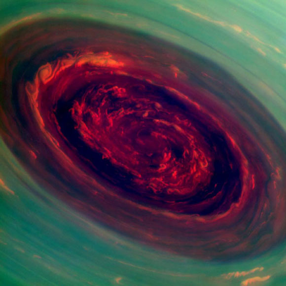 Cassini spacecraft has recently provided scientists the first close-up, visible-light views of a behemoth hurricane swirling around Saturn's north pole. The hurricane's eye is about 1,250 miles (2,000 kilometers) wide, 20 times larger than the average hurricane eye on Earth (NASA / JPL-Caltech / SSI)