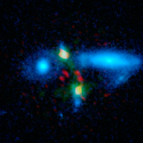 Multi-wavelength view of the merging galaxy pair HXMM01 (ESA / NASA / JPL-Caltech / UC Irvine / STScI / Keck / NRAO / SAO)
