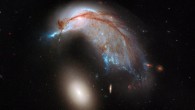 Galaxy pair Arp 142, below the center of the image (NASA / ESA / Hubble Heritage Team / STScI / AURA)