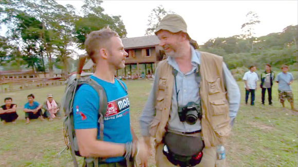 Dominic Monaghan and Dr Peter Jäger in Laos (© Cream Productions, Inc).