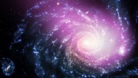 X-ray data, in purple, show the hot gas has a comet-like appearance, caused by the motion of the dwarf galaxy. Optical data reveal the spiral galaxy NGC 1232 in blue and white (X-ray: NASA / CXC / Huntingdon Inst. for X-ray Astronomy / G. Garmire; optical: ESO / VLT).