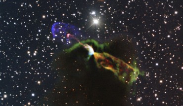 This image of Herbig-Haro object HH 46/47 combines radio observations with ALMA with visible light observations from the New Technology Telescope. The ALMA observations, orange and green, lower right, of the newborn star reveal a large energetic jet moving away from us, which in the visible is hidden by dust and gas. To the left, in pink and purple, the visible part of the jet is seen, streaming partly towards us. Credit: ESO /ALMA / NAOJ / NRAO / H. Arce. Acknowledgements: Bo Reipurth.