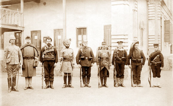 This photograph shows soldiers of the Eight nations alliance in 1900. British and also American soldiers are taller than continental European and Asian soldiers. Left-to-right: Britain, United States, Australian, British India, Germany, France, Austria-Hungary, Italy, Japan.