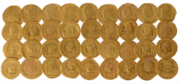36 gold coins dating to the reigns of different Byzantine emperors, c. 350 – 625 CE. Image credit: Ouria Tadmor.