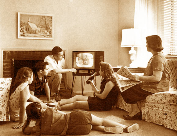 A family watching TV. Image credit: Evert F. Baumgardner.