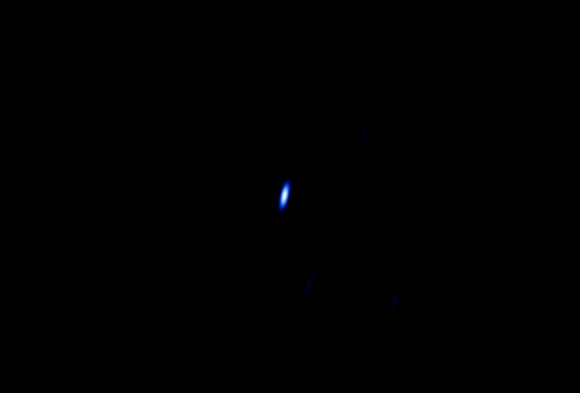 NRAO's Very Long Baseline Array telescope catches a glimpse of the signal from Voyager 1's transmitter as seen from more than 11 billion miles away. Image credit: NRAO / AUI / NSF.