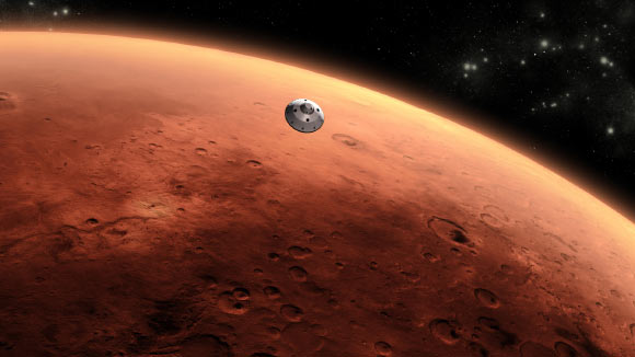 This is an artist's concept of NASA's Mars Science Laboratory spacecraft approaching Mars. The Curiosity rover is safely tucked inside the spacecraft's aeroshell. Image credit: NASA / JPL-Caltech.