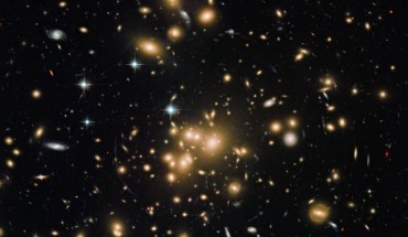 This new Hubble image shows the galaxy cluster Abell 1689. Image credit: NASA / ESA / the Hubble Heritage Team / STScI / AURA / J. Blakeslee / NRC Herzberg Astrophysics Program / Dominion Astrophysical Observatory / H. Ford / JHU.