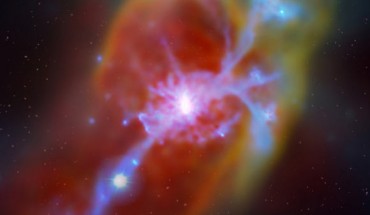 This image shows the galaxy Q1442-MD50, center, with incoming cold gas flow. A stream of primordial inflowing hydrogen is illuminated from behind by a distant background quasar, lower left, - quasar added by an artist. Image credit: MPIA / G. Stinson / A. V. Macciò.