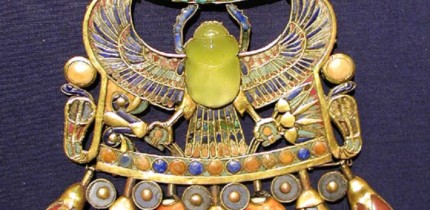 This image shows Tutankhamun's pectoral with a scarab carved from the Libyan Desert Glass. Image credit: Jon Bodsworth.