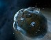 This is an artist's impression of a rocky and water-rich asteroid being torn apart by the strong gravity of the white dwarf star GD 61. Image credit: Mark A. Garlick, Space-art.co.uk / University of Warwick / University of Cambridge.