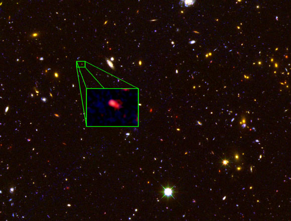This Hubble image shows the galaxy Z8-GND-5296. The galaxy's red color alerted astronomers that it was likely extremely far away, and thus seen at an early time after the Big Bang. Image credit: V. Tilvi / S.L. Finkelstein / C. Papovich / A. Koekemoer / CANDELS / STScI / NASA.