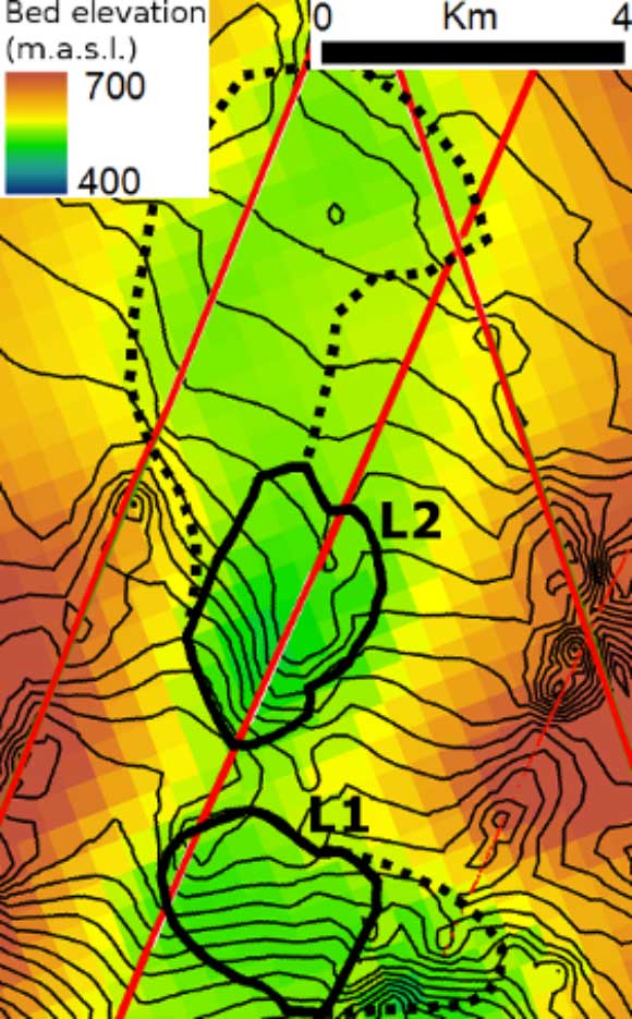 This radar map shows subglacial bed elevations near the town of Qaanaaq; lines show contours of the newly discovered subglacial lakes; dashed lines show possible previous larger contours. Image credit: Palmer SJ et al.