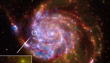 This image shows ULX-1 near a spiral arm of the galaxy Messier 101. Image credit: Chandra X-ray Observatory / Spitzer Satellite / Hubble Space Telescope / GALEX Satellite.