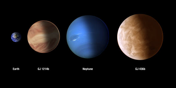 This image compares the sizes of exoplanets GJ 436b and GJ 1214b with Earth and Neptune. Image credit: NASA / ESA / A. Feild and G. Bacon, STScI.