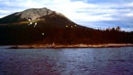 Earthquake lights from Tagish Lake, Yukon-Alaska border region, around the 1st of July, probably 1972 or 1973 (exact date unknown); estimated size – 1 m diameter; closest orbs slowly drifted up the mountain to join the more distant ones. Image credit: Jim Conacher, used with permission.