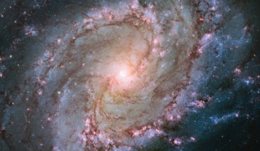 This image shows the scatterings of bright stars and thick dust that make up the barred spiral galaxy Messier 83. Image credit: NASA / ESA / the Hubble Heritage Team / STScI / AURA / William Blair, Johns Hopkins University.