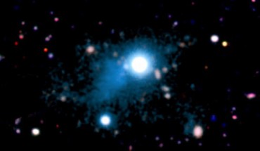 This image shows the nebula (cyan) extending across 2 million light-years that was discovered around the quasar UM 287 (center of the image). Image credit: S. Cantalupo / University of California, Santa Cruz.