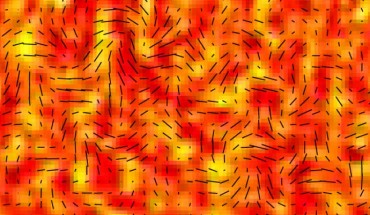 The tiny temperature fluctuations of the cosmic microwave background, shown here as color, trace primordial density fluctuations in the early universe that seed the later growth of galaxies. Gravitational waves from inflation are expected to produce much a fainter pattern that includes twisting B-mode polarization, consistent with the B-mode polarization pattern observed by BICEP2, which is shown here as black lines. The line segments show the polarization strength and orientation at different spots on the sky. Image credit: BICEP2 Collaboration.
