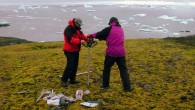 Drilling the frozen moss core on Signy Island. Image credit: Peter Boelen.