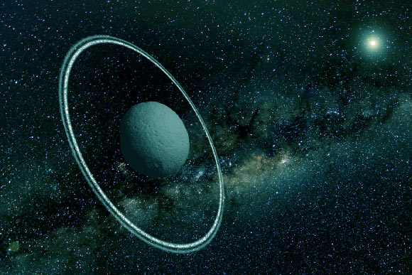 This is an artist’s impression of the asteroid Chariklo. Image credit: University of Copenhagen.