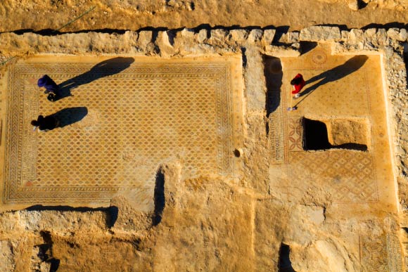 Mosaic floors of a 1,500-year-old monastery unearthed near the Bedouin village of Hura, Israel. Image credit: Skyview Company / Israel Antiquities Authority.