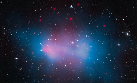 This composite image shows the galaxy cluster ACT-CL J0102-4915, also known as the El Gordo Galaxy Cluster, the most massive cluster of galaxies ever seen to exist when the Universe was just half of its current age of 13.8 billion years. Image credit: NASA / ESA / J. Jee, University of California, Davis / J. Hughes, Rutgers University / F. Menanteau, Rutgers University and University of Illinois, Urbana-Champaign / C. Sifon, Leiden Observatory / R. Mandelbum, Carnegie Mellon University / L. Barrientos, Universidad Catolica de Chile / K. Ng, University of California, Davis.