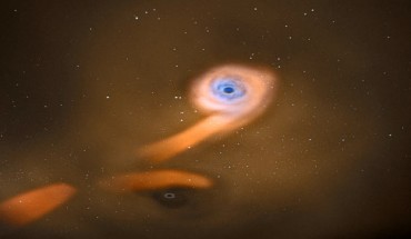 This artist's impression shows a binary supermassive black hole system in the galaxy SDSS J120136.02+300305.5. Image credit: ESA / C. Carreau.