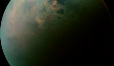 This false-color mosaic, made from infrared data collected by NASA's Cassini spacecraft, reveals the differences in the composition of surface materials around hydrocarbon lakes at Titan, Saturn's largest moon. Titan is the only other place in the solar system that we know has stable liquid on its surface, though its lakes are made of liquid ethane and methane rather than liquid water. While there is one large lake and a few smaller ones near Titan's south pole, almost all of Titan's lakes appear near the moon's north pole. Image credit: NASA / JPL-Caltech / University of Arizona / University of Idaho.