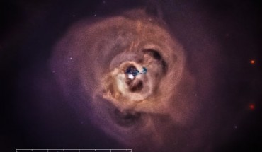 X-ray image of the Perseus galaxy cluster: a new study of the cluster has revealed a mysterious X-ray signal; this signal is represented in the circled data points in the inset, which is a plot of X-ray intensity as a function of X-ray energy. Image credit: Chandra / NASA / CXC / SAO / XMM / ESA / E. Bulbul et al.