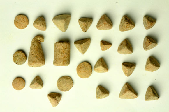 A few of the hundreds of clay tokens unearthed at Ziyaret Tepe, Turkey. Image credit: Ziyaret Tepe Archaeological Project.