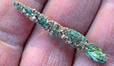The 7,000-year-old metal awl from Tel Tsaf upon discovery. Image credit: Yosef Garfinkel.
