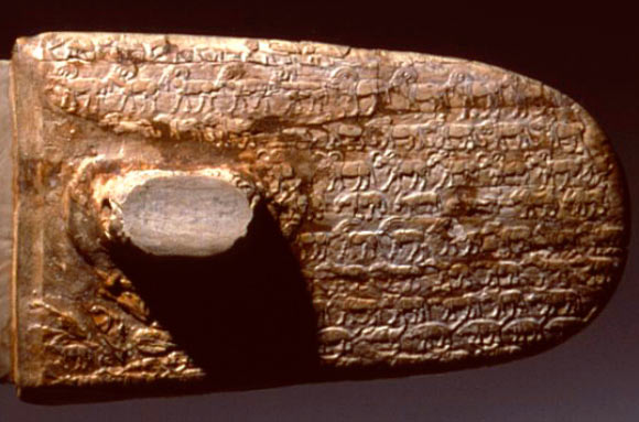 227 animals, including elephants, lions, a giraffe, and sheep, cover both sides of the ivory handle of a ritual knife from the Predynastic Period in Egypt. Image credit: Charles Edwin Wilbour Fund / Brooklyn Museum.