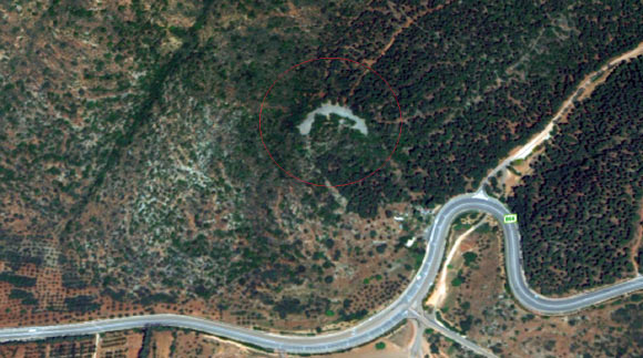 Jethro Cairn, a large crescent-shaped stone monument dating to 3050-2650 BC. Image credit: © Google Earth.