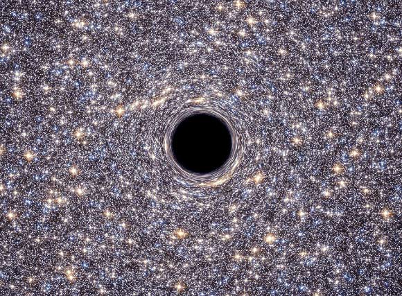 Artist's view of a supermassive black hole at the center of M60-UCD1. Image credit: NASA / ESA.