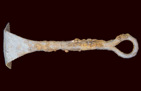 Iron curry comb found with the chariot fittings. Image credit: University of Leicester.