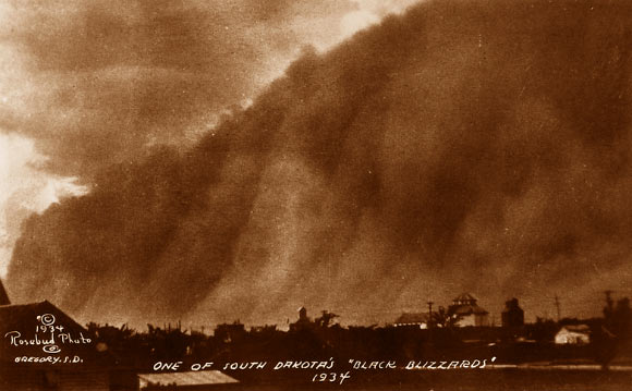 A ‘black blizzard’ dust storm in South Dakota, 1934. Image credit: National Archives FDR Library Public Domain Photographs.