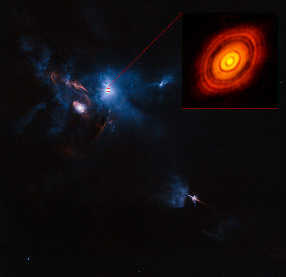 This is a composite image of the young star HL Tauri and its surroundings using data from ALMA and the Hubble Space Telescope. Image credit: ALMA / ESO / NAOJ / NRAO / ESA / Hubble / NASA / Judy Schmidt.