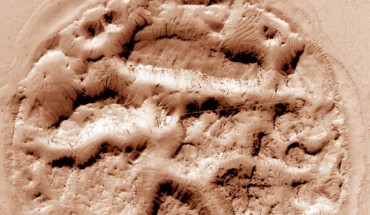 The circular mound spotted by NASA scientists is in Athabasca Valles, north-central Elysium Planitia, Mars. Image credit: NASA / JPL-Caltech / University of Arizona.