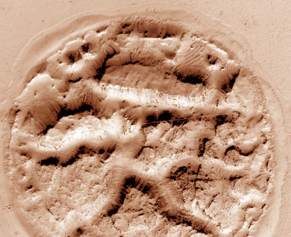 The circular mound spotted by NASA scientists is in Athabasca Valles, north-central Elysium Planitia, Mars. Image credit: NASA / JPL-Caltech / University of Arizona.