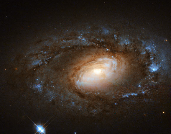 Color composite image of the starburst spiral galaxy NGC 4102 obtained with Hubble's Wide Field Planetary Camera 2. Image credit: ESA / Hubble / NASA / S. Smartt, Queen's University Belfast / Renaud Houdinet.