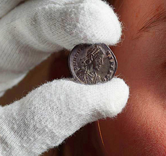 A Roman coin from the Aberdeenshire hoard. Image credit: © Phil Wilkinson / University of Aberdeen.