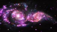 X-ray data from Chandra have revealed that NGC 2207 (left) and IC 2163, currently in the process of colliding with one another, have produced one of the most bountiful collections of super bright X-ray lights called ultraluminous X-ray sources. Image credit: X-ray – NASA / CXC / SAO / S.Mineo et al; optical – NASA / STScI; infrared: NASA / JPL-Caltech.