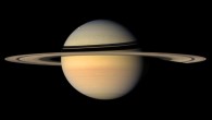 This image was obtained on 10 September 2007 by NASA's Cassini spacecraft, at a distance of approximately 3.3 million km from Saturn. Rhea - Saturn's second largest moon - is visible against the bluish backdrop of the planet's northern hemisphere. Mimas - Saturn's seventh largest moon - appears as a speck against the ring shadows on planet's western limb. Image credit: NASA / JPL / Space Science Institute.