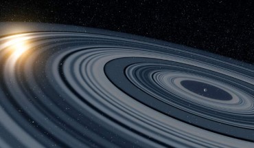 The rings of J1407b are shown eclipsing the young Sun-like star J1407. Image credit: Ron Miller.