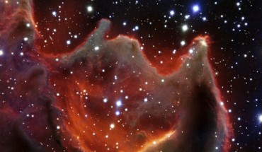 This image shows the cometary globule CG4; although it looks huge and bright in this image it is actually a faint nebula and not easy to observe; the exact nature of CG4 remains a mystery. Image credit: ESO.