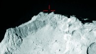 OSIRIS instrument on the Rosetta spacecraft captured this image of Comet 67P/Churyumov–Gerasimenko on November 12, 2014; marked is what Rosetta scientists believe to be the Philae lander above the rim of the large depression – named Hatmehit – on the comet’s small lobe. Image credit: ESA / Rosetta / MPS for OSIRIS team / UPD / LAM / IAA / SSO / INTA / UPM / DASP / IDA.
