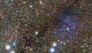 This image shows the famous Trifid Nebula to the right of center; it appears as faint and ghostly at these infrared wavelengths when compared to the familiar view at visible wavelengths; this transparency has brought its own benefits - many previously hidden background objects can now be seen clearly; among these are two newly discovered Cepheid variable stars, the first ever spotted on the far side of our Milky Way Galaxy near its central plane. Image credit: ESO / VVV consortium / D. Minniti.